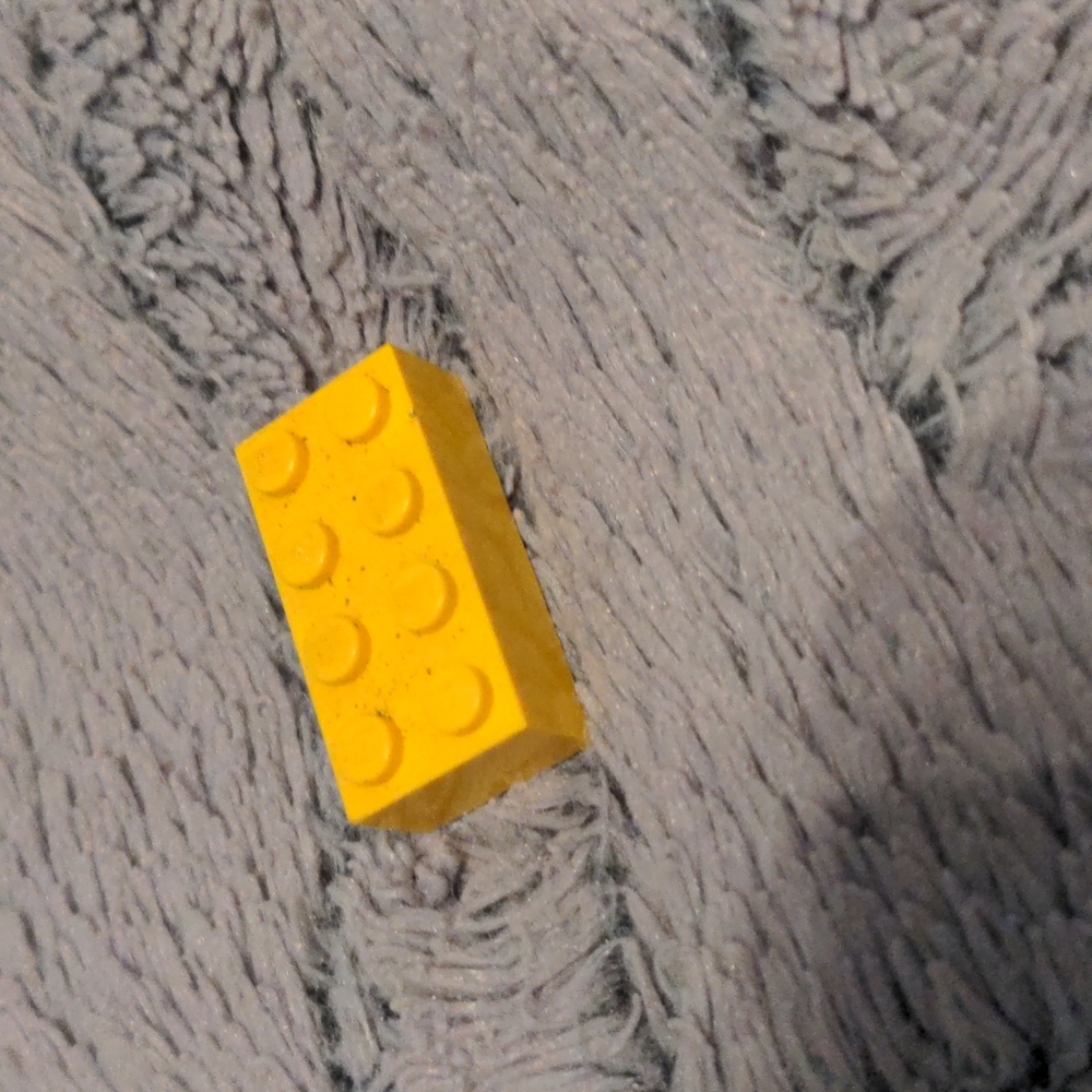 Yellow Lego 4 by 2 brick